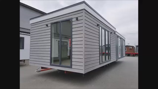 Maison container 40 pieds, lumineuse, meublée, isolée, type T2, finition haut de gamme recouvert en bois rouge